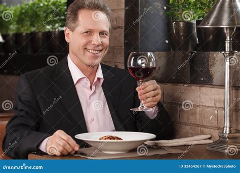 Man Drinking Wine. Portrait Of Cheerful Businessman Drinking Royalty Free Stock Photography ...