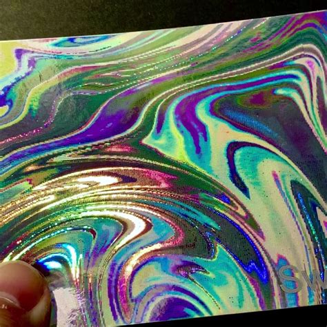 Poster artists love our Swirl3 holographic pattern, and often screenprint artwork on top of it ...