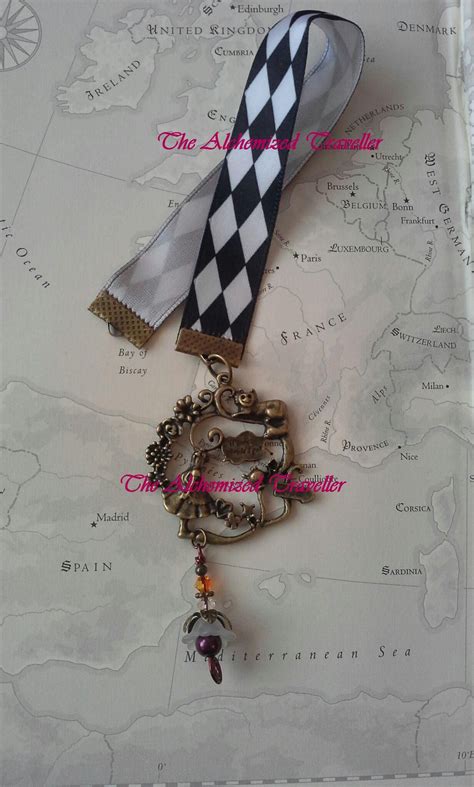 The Alchemized Traveller | Ribbon bookmarks, Alice in wonderland, Hatter