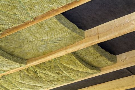 Thermal Insulation Mineral Rock Wool Installation at the New Building Attic Ceiling Stock Image ...