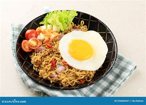 Indomie Goreng or Mie Goreng, Indonesian Popular Instant Noodle Stock ...