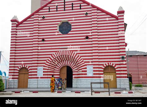 The distinctive Notre Dame Roman Catholic cathedral in Cotonou, Benin, stands out for its red ...