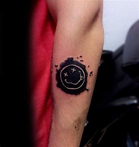 Nirvana Smiley Face Logo Tattoo