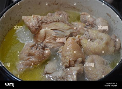 Cooking food on the stove Stock Photo - Alamy