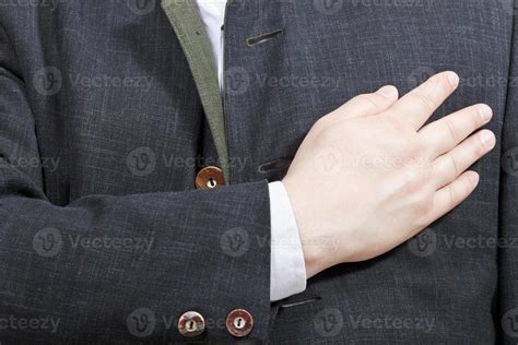 Hand On Chest Stock Photos, Images and Backgrounds for Free Download