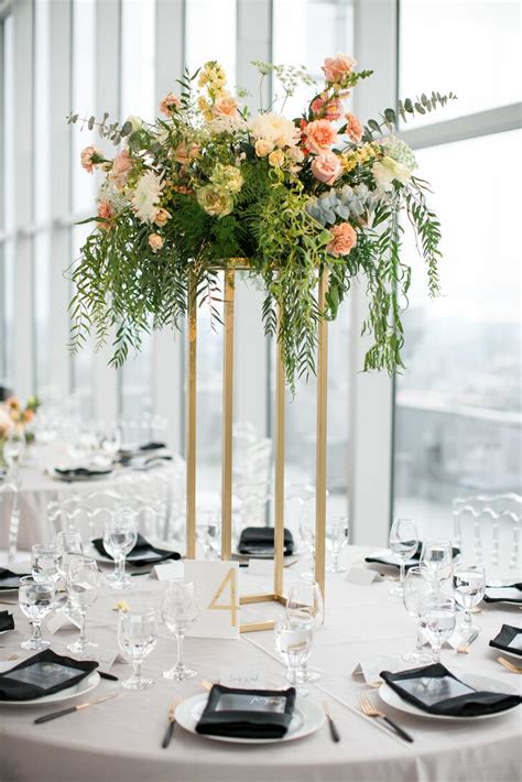 Round Tables with Elegant Tall Centerpieces