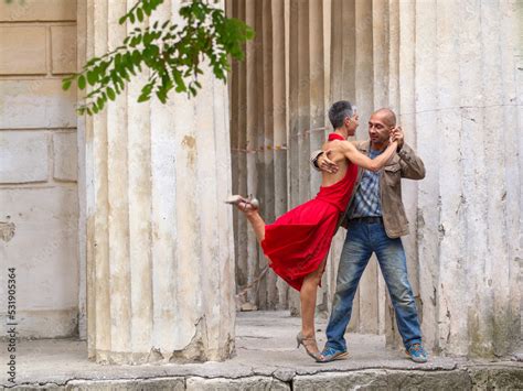 Tango nuevo dance - the famous partner dance with a woman in a red ...