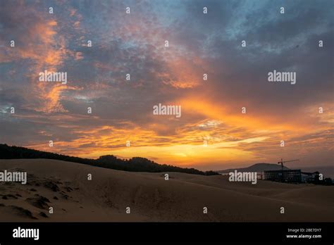 Sunrise over Sand Dunes in Mui Ne Stock Photo - Alamy