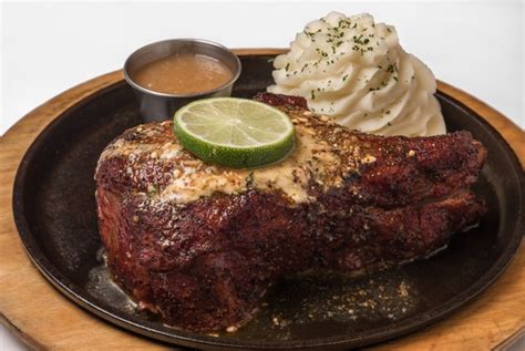 Perry’s Steakhouse is serving its pork chop lunch for 79 cents to the ...