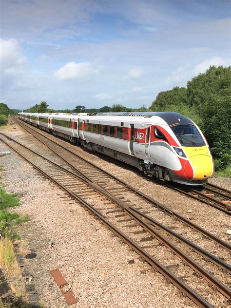 The New AZUMA train passes Gascoinge Wood 16.6.19. It can run on diesel or draw power from the ...