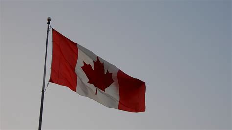 Canadian Flag Blowing In Wind At Sunset Stock Footage SBV-348374493 ...