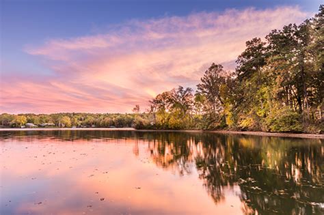 sun setting over Lake Hamilton - Lake Homes Realty Articles and Info - LakeHomes.com