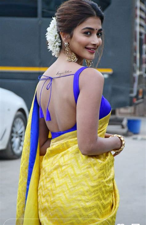 Pooja Hegde aces her traditional look in a yellow silk saree for ...