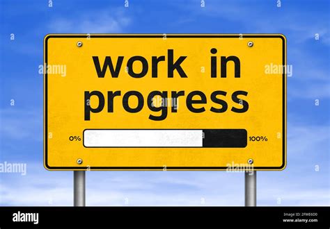 road sign - work in progress Stock Photo - Alamy