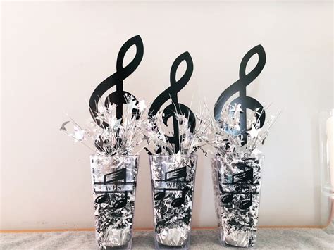 Music centerpieces | Music centerpieces, Music themed parties, Music party decorations