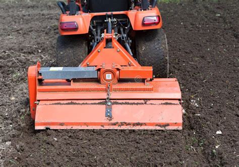 Closeup Of Utility Tractor's Tiller Attachment Stock Photos - Image: 25141233