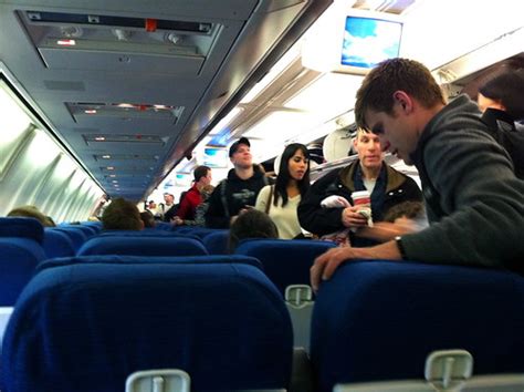 Airplane seating | Passengers boarding an airplane from insi… | Flickr
