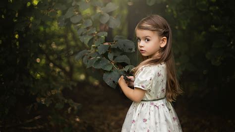 Nice Girl Child With White Dress Is Touching Leaf HD Cute Wallpapers | HD Wallpapers | ID #54729