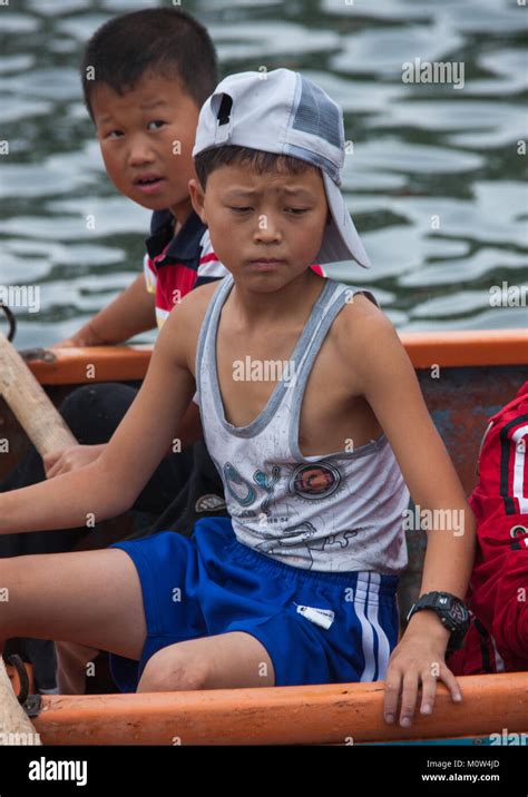 North Korean pioneers boys in boats in Songdowon international children's camp, Kangwon Province ...