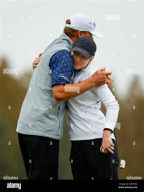 Orlando, Florida, USA. December 16, 2023: Steve Stricker hugs daughter Izzy Stricker after Round ...