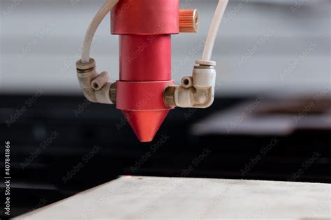 Laser CNC cutting wood. Modern machine industrial technology Stock ...