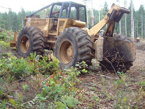 Cat 528 log Skidder with Esco Swing Grapple | Heavy equipment, Logging ...