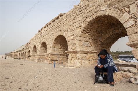 Roman aqueduct, Caesarea Maritima, Israel - Stock Image - C049/8535 - Science Photo Library