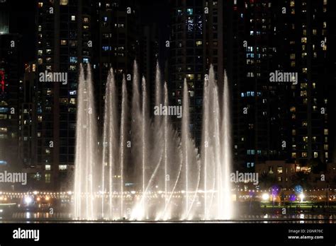 The dubai mall fountain show at night. Dubai. United Arab Emirates ...