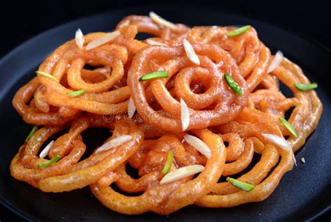 Indian jalebi in a plate stock image. Image of punjabi - 5092277