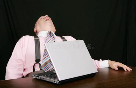 Sleeping Business Man At His Desk Royalty Free Stock Image - Image: 4962056