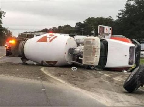 Crash involving overturned cement truck causes brief hazmat situation ...