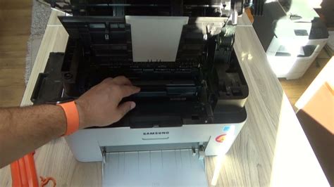 Replacing toner cartridge Samsung M2070 - YouTube