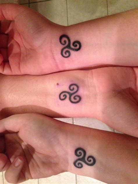 Sisters symbol tattoo