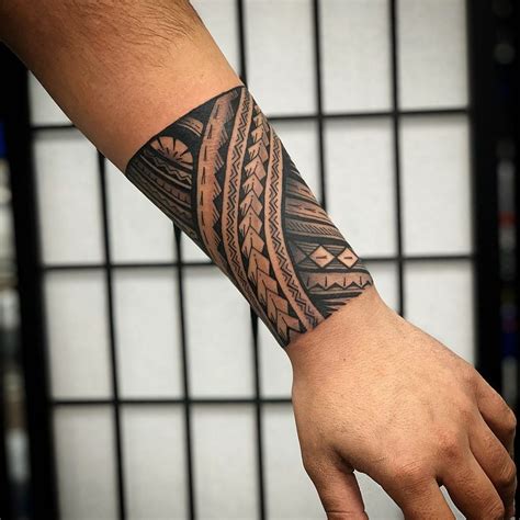 tongan tatau | Polynesian tattoo sleeve, Polynesian forearm tattoo, Forearm band tattoos