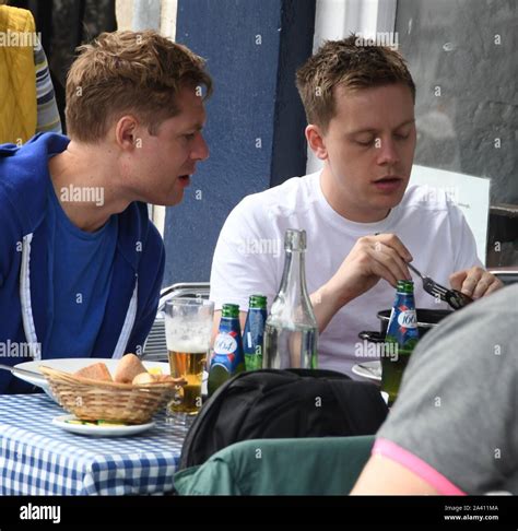 The Lefy wing journalist Owen Jones enjoying lunch on the Grassmarket whilst visiting the ...