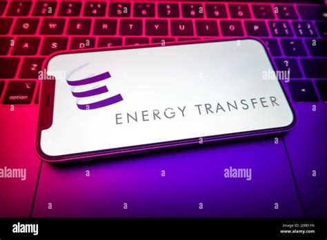 In this photo illustration, an Energy transfer logo is displayed on a ...