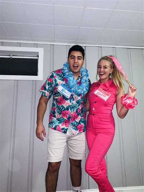 a man and woman are dressed up in bright pink outfits while standing next to each other