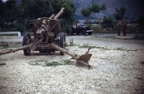 A captured German 105mm Howitzer near Naples, Italy in 1944 or 1945 | The Digital Collections of ...