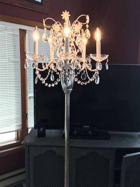 Chandelier floor lamp made from vintage crystal chandelier and chrome Torchiere lamp.