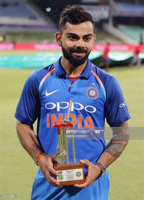 News Photo : India's Virat Kohli poses with his trophy for Man ...