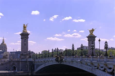 Arch Bridge with Golden Statues · Free Stock Photo