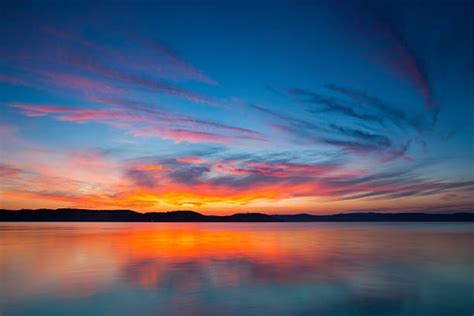 Royalty Free Sunrise Over Water Pictures, Images and Stock Photos - iStock