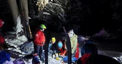 Skier rescued after being buried "chest-deep in debris" by avalanche in ...