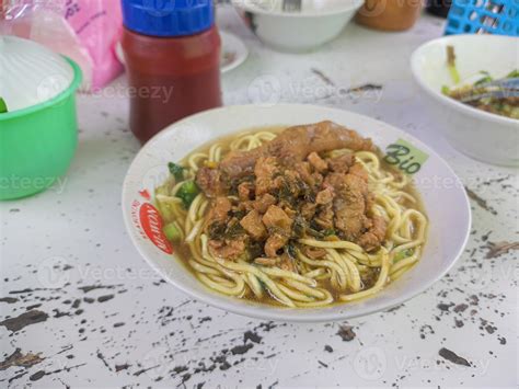 chicken noodles. a typical street food from Indonesia. is a fairly famous street food 13247259 ...