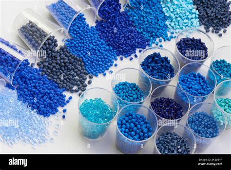 different blue plastic resin granulates for injection moulding process in different granulate ...