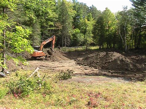 Digging our resevoir/swimming pond.