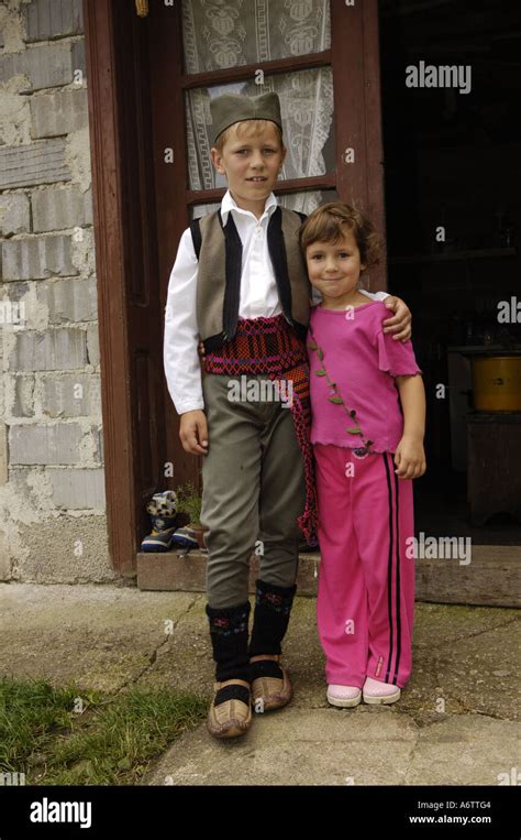 a boy in serbian traditional costume holding his sister Stock Photo - Alamy