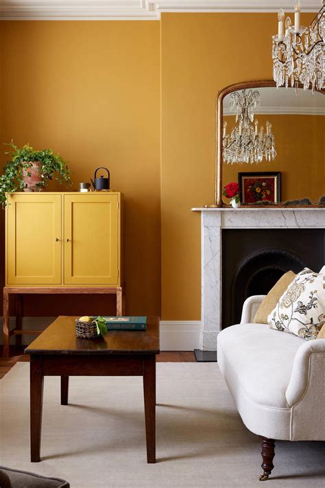 Ochre Signature room at Heckfield Place #ModernHomeDecorLivingRoom | Yellow walls living room ...