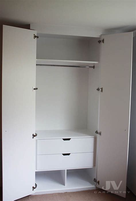 The wardrobe has beautifully designed drawers at the bottom which are ...