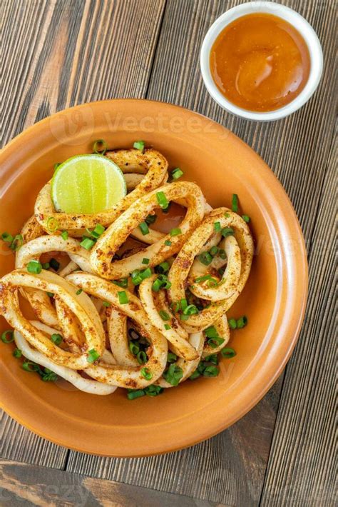 Fried squid rings 25234003 Stock Photo at Vecteezy